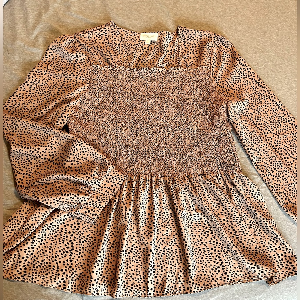 Smocked peplum top